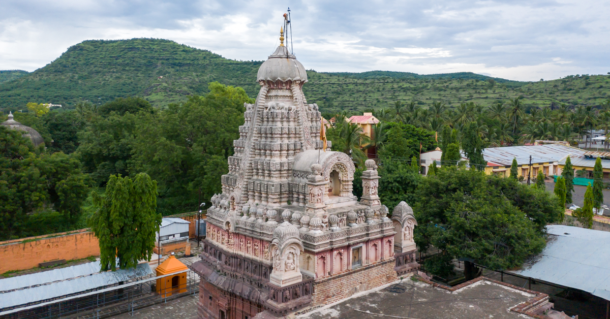  Grishneshwar Jyotirlinga temple surrounded by natural greenery and build of its 5 tiered shikhara. 